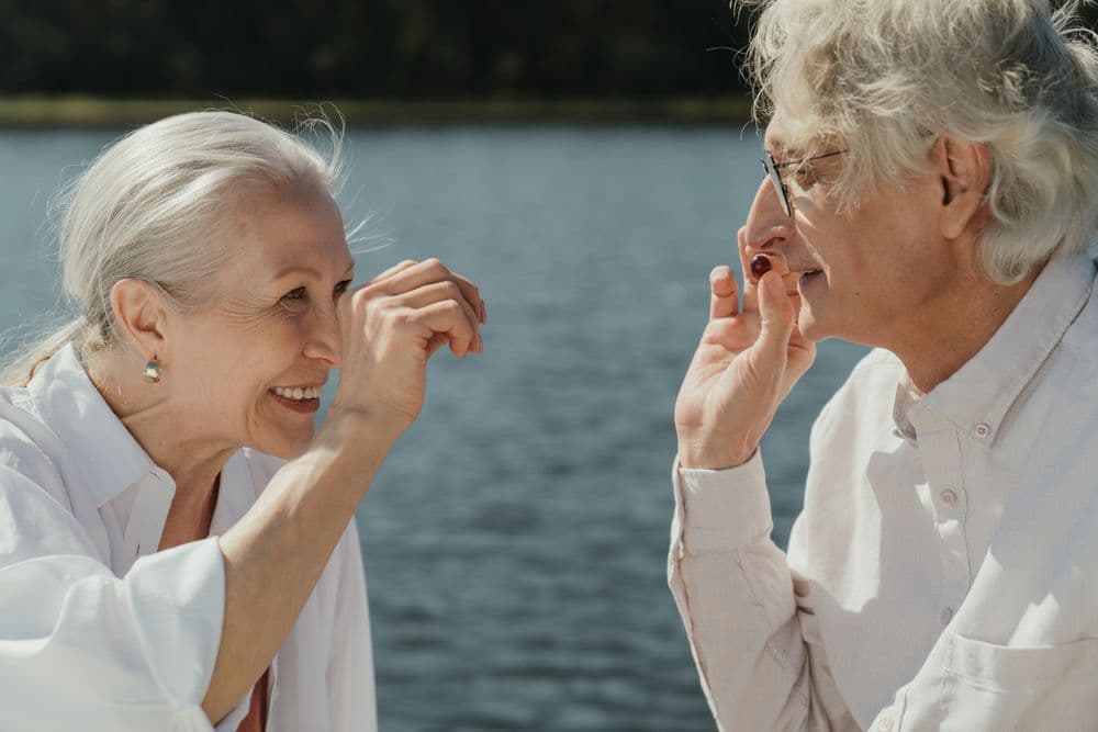 A smiling retired couple outdoors